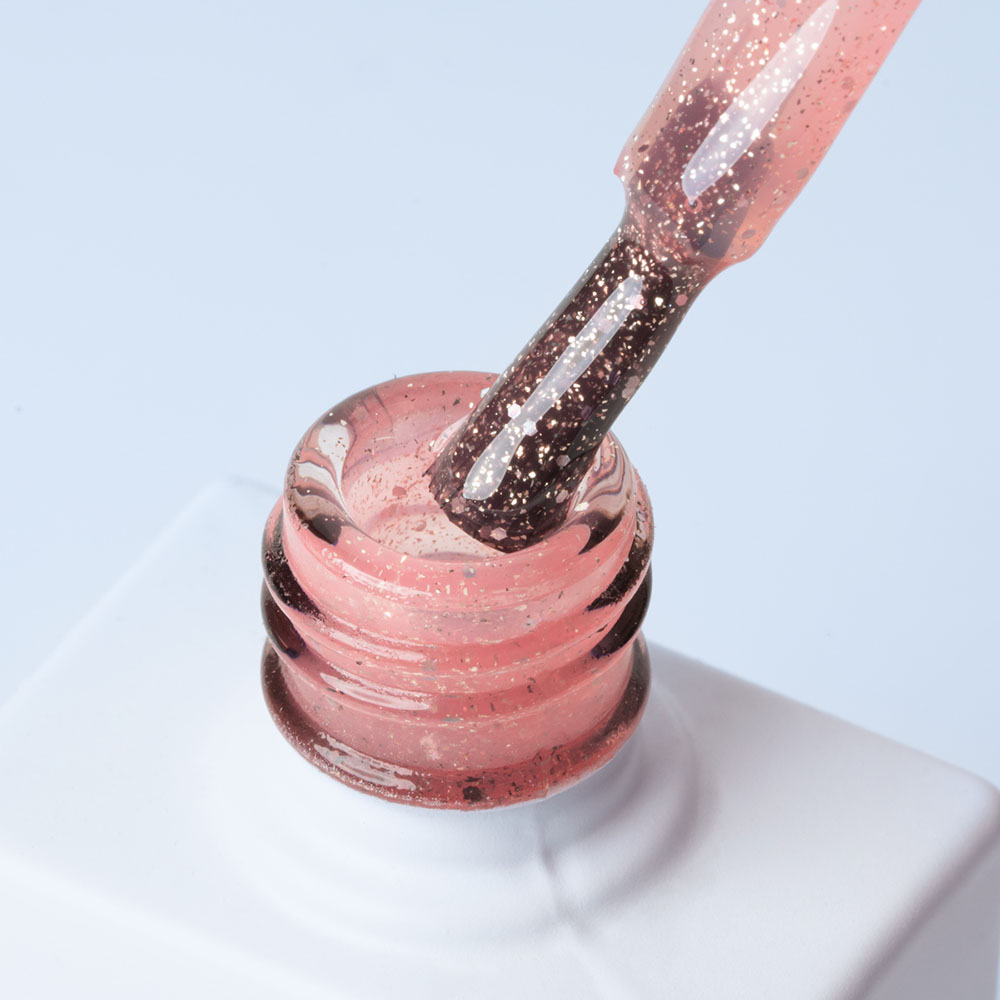 Lakier hybrydowy No. 041 - w odcieniu jasnoróżowy brokatowy - pędzelek zanurzony w lakierze