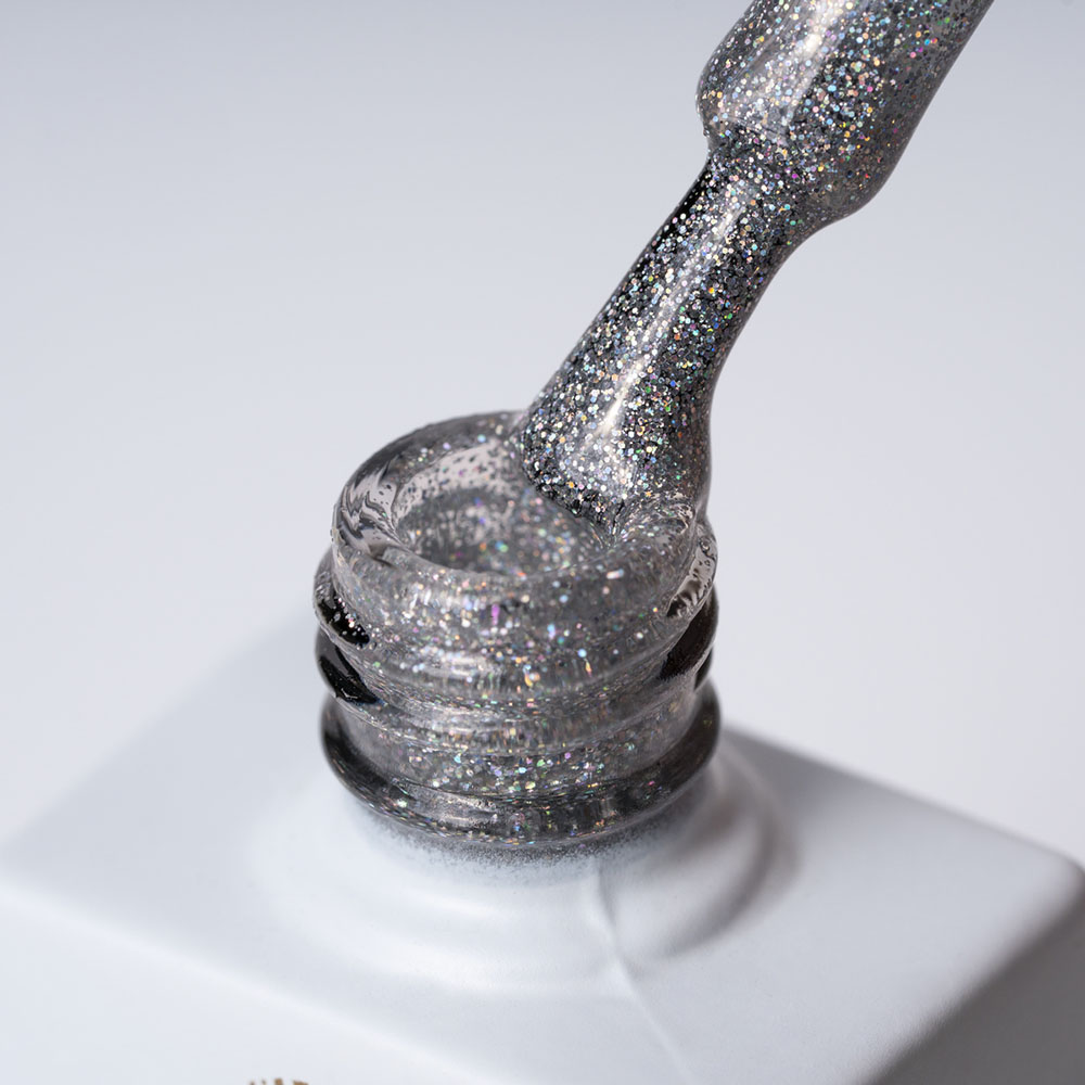 Lakier hybrydowy No. 117 - w odcieniu srebrny holo - pędzelek zanurzony w lakierze